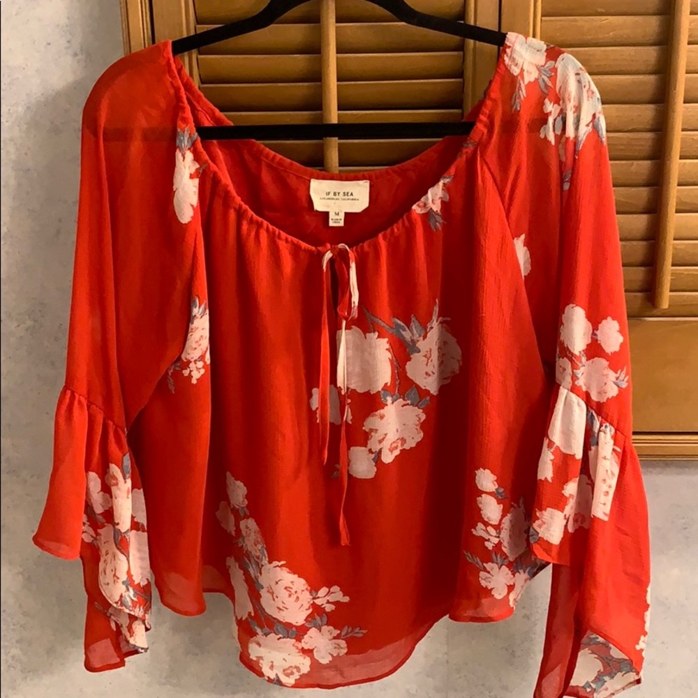 Beautiful red floral blouse with flowy sleeves